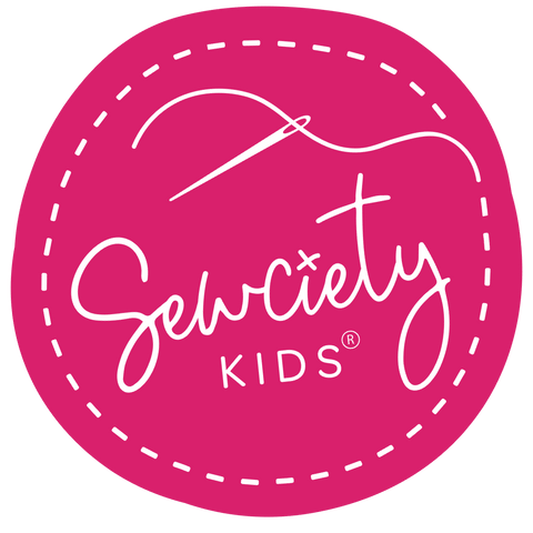 A pink circular logo with a white needle and thread forming the word "Sewciety Kids".