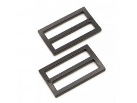 Two black metal 1.5-inch strap sliders are angled on a white background.