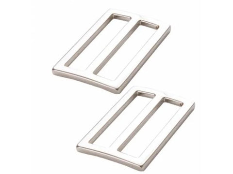 Two nickel-colored 1.5-inch rectangular sliders for adjustable straps.