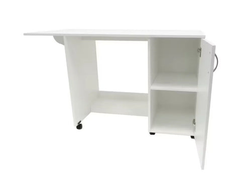 White craft desk with a drop leaf, open storage, and a cabinet with a silver handle.