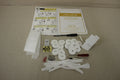 A Baby Lock Accolade serger instruction manual and accessories are laid out on a surface.