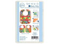 June Tailor Quilt As You Go Baby Bibs kit with three colorful bibs and instructions.