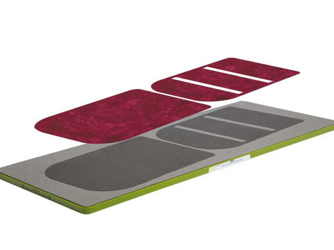 A GO! Lucky Penny Wallet die set with two red fabric pieces on top.