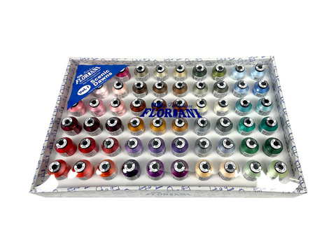 A box containing 60 spools of Floriani embroidery thread in various colors.