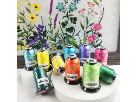 A collection of Floriani embroidery thread spools in various bright colors.