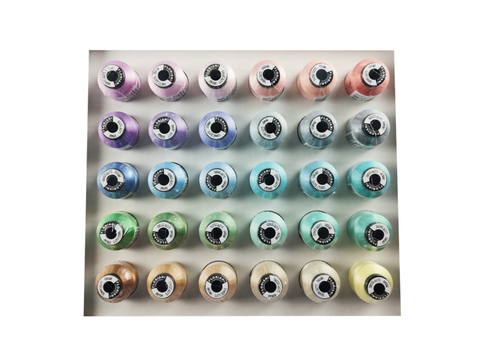 Thirty spools of Floriani embroidery thread in pastel colors are arranged in rows.