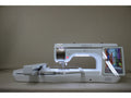 A white Baby Lock Solaris 2 sewing and embroidery machine with a digital display.