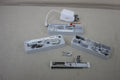 Baby Lock Solaris sewing and embroidery machine accessories are displayed on a light surface.