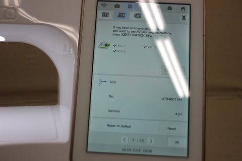 A Baby Lock Solaris 2 sewing and embroidery machine displays an upgrade certification screen.