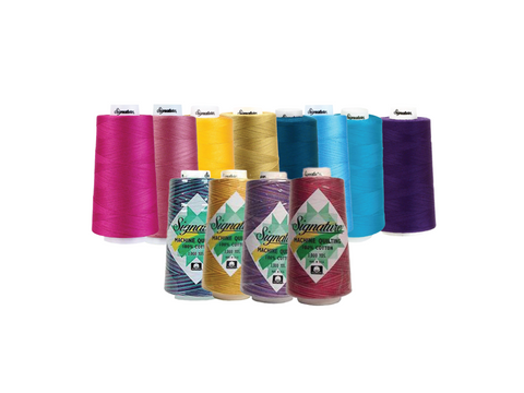 A set of 12 spools of Signature quilting thread in assorted solid and variegated colors.