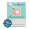 A June Tailor Camera Quilt Block kit with a pink camera design.