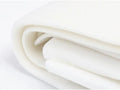 White By Annie Soft & Stable fabric, folded to show its thickness and soft texture.